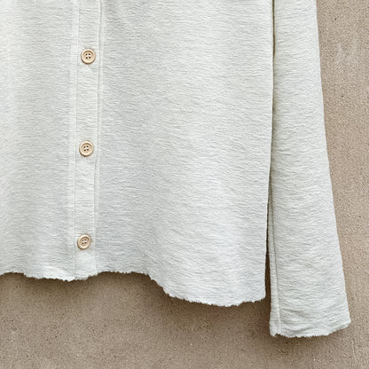 Kofta i merinoull med knappar - Pearl Grey Melange